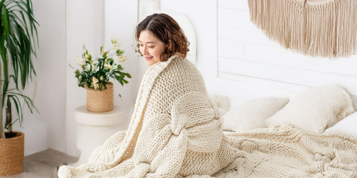 ニットの毛布とソファの毛布と昼寝のins北欧風の砂のマットに部屋を飾った ニットの毛布とソファの毛布と昼寝のins北欧風の砂の